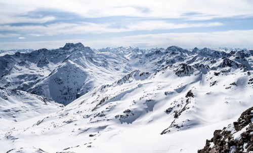 Mountain panorama with view of peaks of the Bernina group, view from Piz Grialetsch in winter,