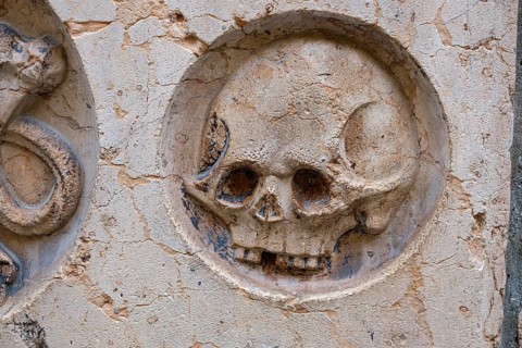 Relief of a skull on an epitaph, Church of Our Lady, or Cathedral of Our Lady, in Munich, Bavaria,