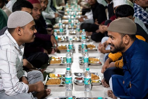 GUWAHATI, INDIA - MARCH 2: Muslims at a mosque for Ramadan's first Iftar during Muslim holy month