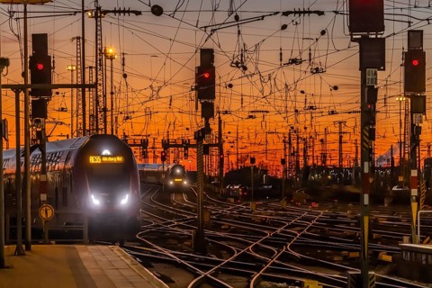 Track apron with trains, rails, points, pylons and signalling systems. Infrastructure at the main