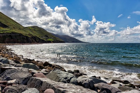 Coastline, rocky coast, Rossbeigh beach on the Atlantic coast, spring clouds, panoramic road Ring
