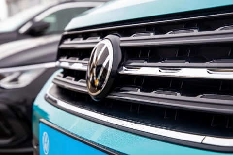 Close-up of vehicles from the car manufacturer VW in a car dealership