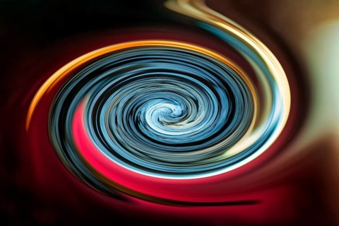 Colourful luminous spiral, blue, red, left-turning, illustration, abstract, symbol photo
