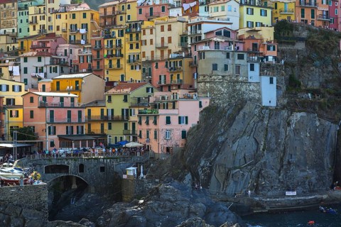 Colourful multi storied stucco cladded residentialapartment buildings in Manarola village, Cinque