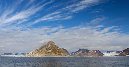 Luciapynten, mountain with steep sea cliffs in Hornsund fjord in summer, Svalbard, Spitsbergen,