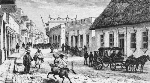 Street scene in Barranquila, a Spanish foundation, horse-drawn carriage, riders, pedestrians,