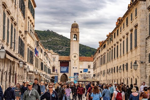 Main promenade Stradun or Placa and the landmark bell tower in Dubrovnik, Croatia, Europe