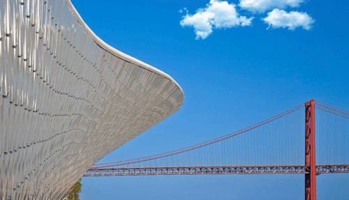 Lisbon, Landmark suspension 25 of April bridge over Tagus reiver near Belem tower