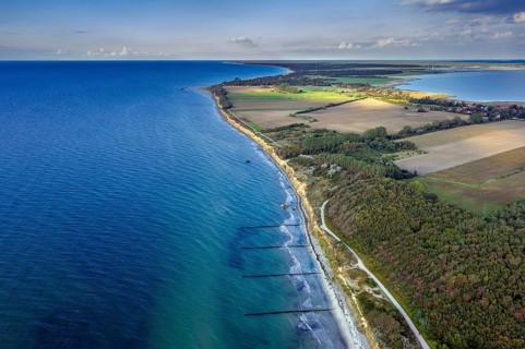 Aerial view over beach and sea cliffs of Wustrow on the Fischland peninsula along the Baltic Sea,
