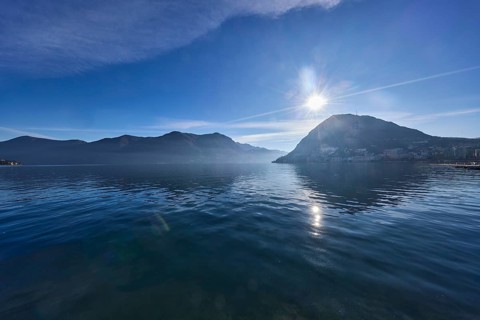 Lake, hills, haze, fog, backlight, blue sky with veil clouds, Lake Lugano, Lugano, Lugano district,
