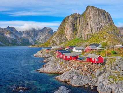 Rorbuer in Hamnoy, Mount Olstinden, blue sky, Moskenesoya, Lofoten, Norway, Europe