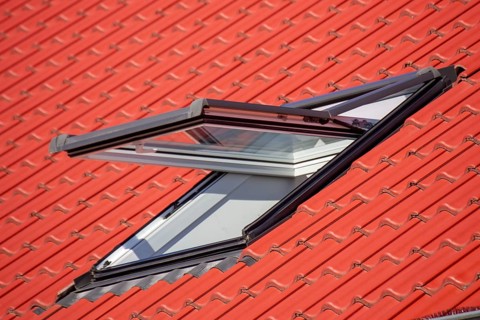 Close-up of a half-open skylight on a new building