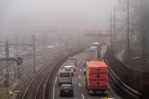 Dense fog, with visibility sometimes less than 100 metres, A40 motorway, city passage in Essen,
