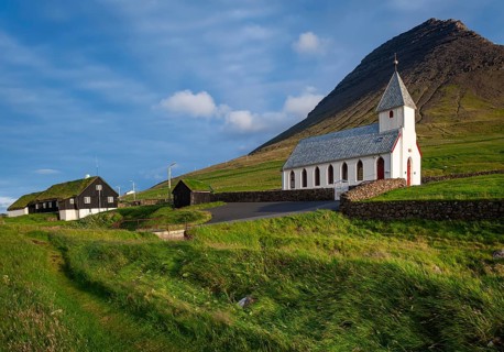 Church in front of a mountain backdrop, Malinsfjall mountain, Vidareidi, Vidoy island, Viðareiði,