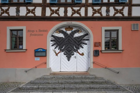 Double eagle on the entrance gate of today's Gasthof Obleyhof, 1385 to 1803 Spitalhof and then