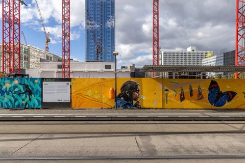 Construction site, construction fence and crane at Alexanderplatz in Berlin, Germany, Europe