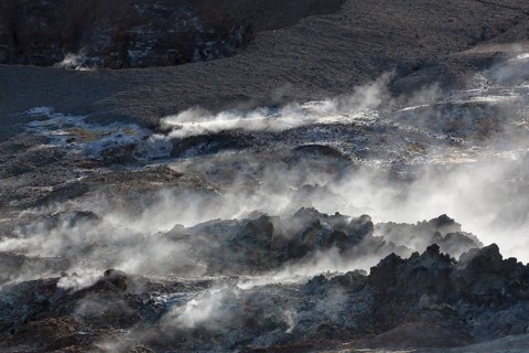 Steam evaporating of the ground at Gunnuhver, close to Reykjanes lighthouse. Gunnuhver is the heart