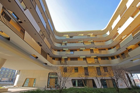Modern golden building Pandion Doxx, golden, residential complex, inner courtyard, customs harbour,