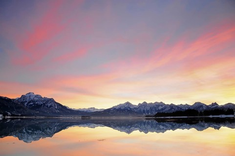 Sunset at the Forggensee near Füssen in the Allgäu, on the left the Säuling (2047 m), Bavaria,