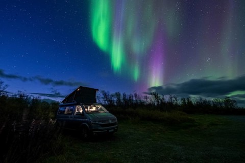 Northern lights over camper, VW California, Lyngen, Troms og Finnmark, Norway, Europe