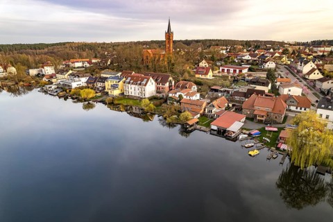 The town of Feldberg on Feldberger Haussee with the town church seen from the air, Feldberger