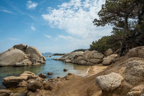 Lonely beach with granite rocks, Spiaggia Li Cuncheddi, Capo Ceraso, near Olbia, Sardinia, Italy,