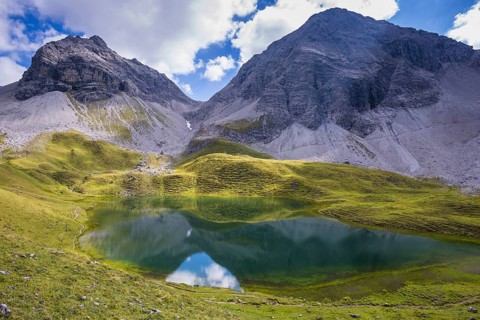 Rappensee, behind it Hochgundspitze, 2459m, and Rappenseekopf, 2468m, Allgaeu Alps, Allgaeu,