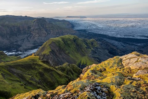 Impressive landscape with mountains and glaciers in the evening light, glacier tongues Huldujökull