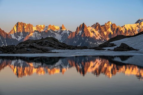 Evening mood, mountain landscape at sunset, alpenglow, water reflection in Lac Blanc, mountain