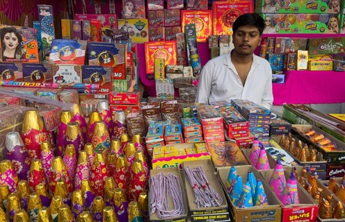 Various firecrackers displayed for sell at a market on the eve of Diwali, the Hindu festival of