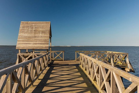 Slowinski National Park is a national park in Pomeranian Voivodeship, northern Poland. A pier at