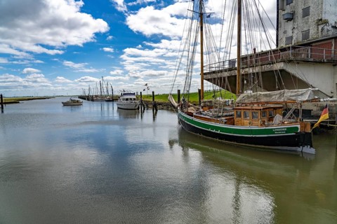 Sailing boat in Süderhafen harbour, Nordstrand peninsula, Nordfriesland district,