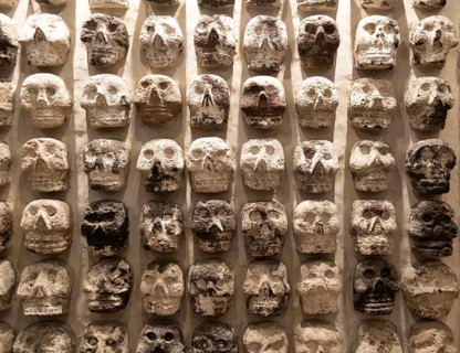 Wall of stone human skulls, archaeological site and museum of Templo Mayor, Mexico City, Mexico,