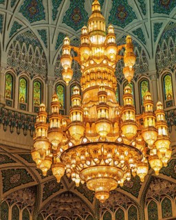 Dome and illuminated chandelier in the Sultan Qaboos Mosque, Muscat, Arabian Peninsula, Sultanate