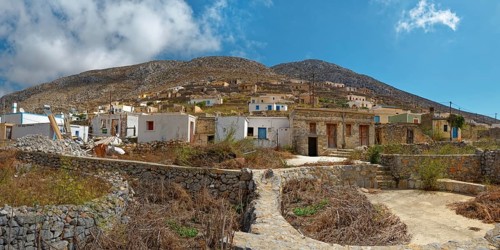 The traditional and idyllic mountain village of Avlona with stone houses and dry vegetation,
