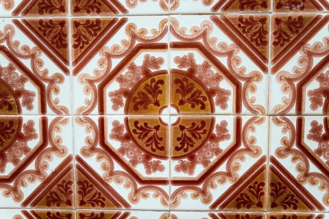 Traditional ceramic tiles with red and brown decorative pattern, Azulejos, Portugal, Europe