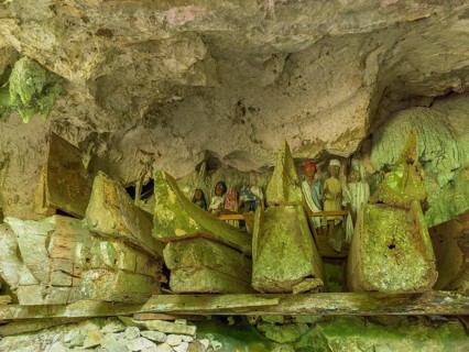 Ancient burial sites, old wooden coffins and carved dolls, rock tombs, Tau Tau Lemo, Rantepao, Tana
