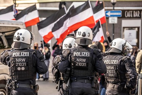 The neo-Nazi group Jung und Stark, JS, demonstrates in the city centre of Essen, demanding the