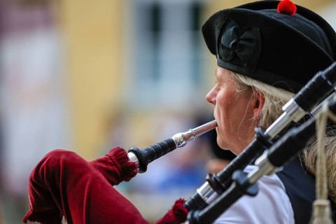 Portrait of a bagpiper, bagpipe orchestra, pipe concert, Sigmaringen, Baden-Württemberg, Germany,