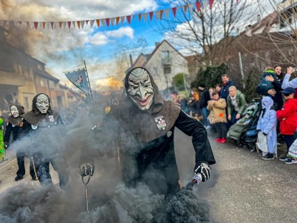 Hofener Hogamale with smoke bomb at the big carnival parade of the Hofener Scillamännle, Hofen,
