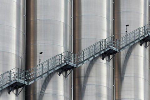 High silo facility for bulk goods, aluminium silo with external staircase, Parallelhafen,
