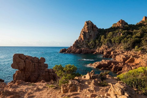 Red rocks and sea, Spiaggia Su Sirboni, sunrise, near Tertenia, Province of Ogliastra, Sardinia,