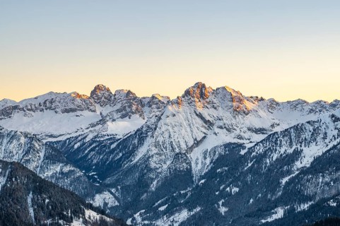 Beautiful landscape of the Mountain silhouettes of the Sexten Dolomites on a sunny winter day,