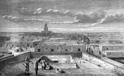 City view of the oasis city of Timbuktu in the 19th century, flat mud houses, tower of a mosque,