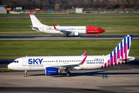 Sky Express Airbus A320 and Norwegian Boeing 737, aircraft after landing at Düsseldorf Airport,