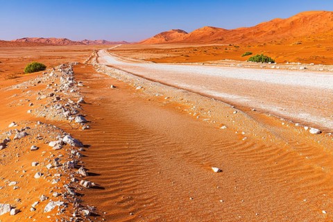 Wide road leads through the Rub al Khali desert, Dhofar province, Arabian Peninsula, Sultanate of
