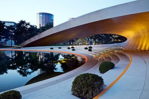 Illuminated Porsche Pavilion in the evening, Autostadt, Volkswagen AG, Wolfsburg, Lower Saxony,