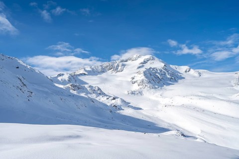 Snow-covered mountain landscape, mountain peak Monte Cevedale and glacier Zufallferner and