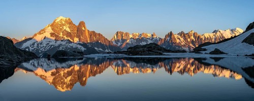 Evening mood, mountain landscape at sunset, alpenglow, water reflection in Lac Blanc, mountain