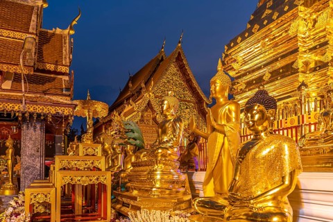 Buddha statues in the Buddhist temple complex Wat Phra That Doi Suthep, landmark of Chiang Mai at